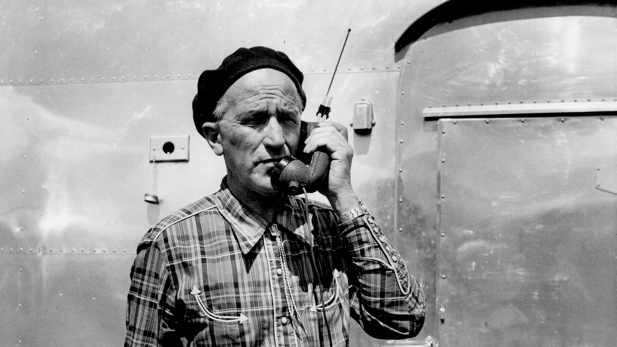 Wally-Byam-with-Telephone-Header|Wally-Byam-with-Telephone-Preview|Africa-Caravan-Bob-Notle-Typewriter-Schoolwork|Wally-Byam-with-Soundscriber-inside-Gold-Trailer-Africa-Caravan-1|Wally-Byam-with-Soundscriber-inside-Gold-Trailer-Africa-Caravan-2