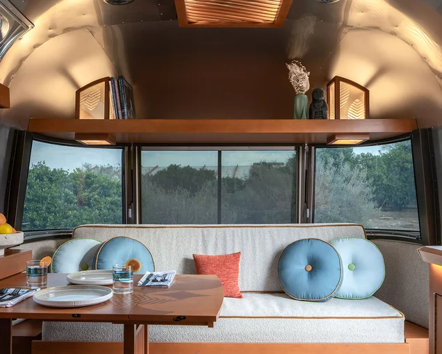 airstream-frank-lloyd-wright-usonian-limited-edition-blog-bannerjpg|AIR MKT FLW 2025 Folding Dinette Hot Spot|airstream-frank-lloyd-wright-usonian-limited-edition-blog-preview|Andrew Pielage Photography|Andrew Pielage Photography|Andrew Pielage Photography|Frank Lloyd Wright mobile kitchen design|airstream-frank-lloyd-wright-usonian-limited-edition-convertibility-in-primary-sleeping-area|Andrew Pielage Photography|airstream-frank-lloyd-wright-usonian-limited-edition-kentuck-knob-usonian-convertibility|Andrew Pielage Photography|Eugene "Gene" Masselink working on a mural in Frank Lloyd Wright's Taliesin West's office, April 1960 From the John Amarantides papers, Frank Lloyd Wright Foundation Collection Eugene "Gene" Masselink working on a mural in Frank Lloyd Wright's Taliesin West's office, April 1960 Eugene "Gene" Masselink working on a mural in Frank Lloyd Wright's Taliesin West's office, April 1960. 1910.629.1-6. The mural from the TAA designed Lewis and Roca law firm in Phoenix. From the John Amarantides papers, Frank Lloyd Wright Foundation Collection|Andrew Pielage Photography|airstream-frank-lloyd-wright-usonian-limited-edition-gordon-leaf-pattern-collage|AIRMKT 2025 FLW 28RB Logo PRINT.tif-2|Andrew Pielage Photography|airstream-frank-lloyd-wright-usonian-limited-edition-badge 1|Andrew Pielage Photography|Andrew Pielage Photography|airstream-frank-lloyd-wright-usonian-limited-edition-slatted ceiling fixture|airstream-frank-lloyd-wright-usonian-limited-edition-wally-byam-and-frank-lloyd-wright