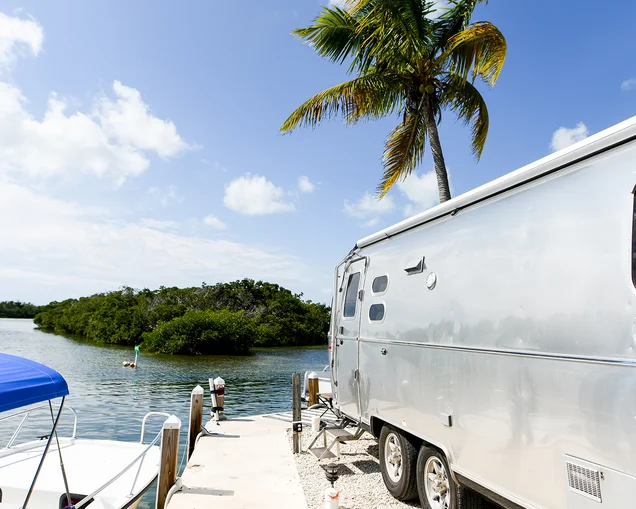 Flying-Cloud-Dewinterization-Header|Flying-Cloud-exterior-dewinterization-preview|Airstream-Dewinterization-Maintenance|Airstream-Tire-Check|Airstream-Cleaning-Interior|A man cleaning the outside of his Airstream travel trailer.|A man dewinterizing his Airstream travel trailer and checking his propane tank.|Dewinterizing an Airstream travel trailer by flushing the plumbing.