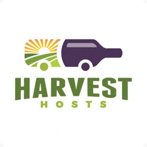 Logo featuring a wine bottle and RV shape with a sunrise over fields, accompanied by the text "Harvest Hosts" in green letters.