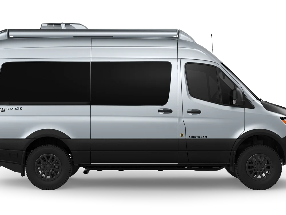 Silver Airstream Interstate 19GTX touring coach, side view.