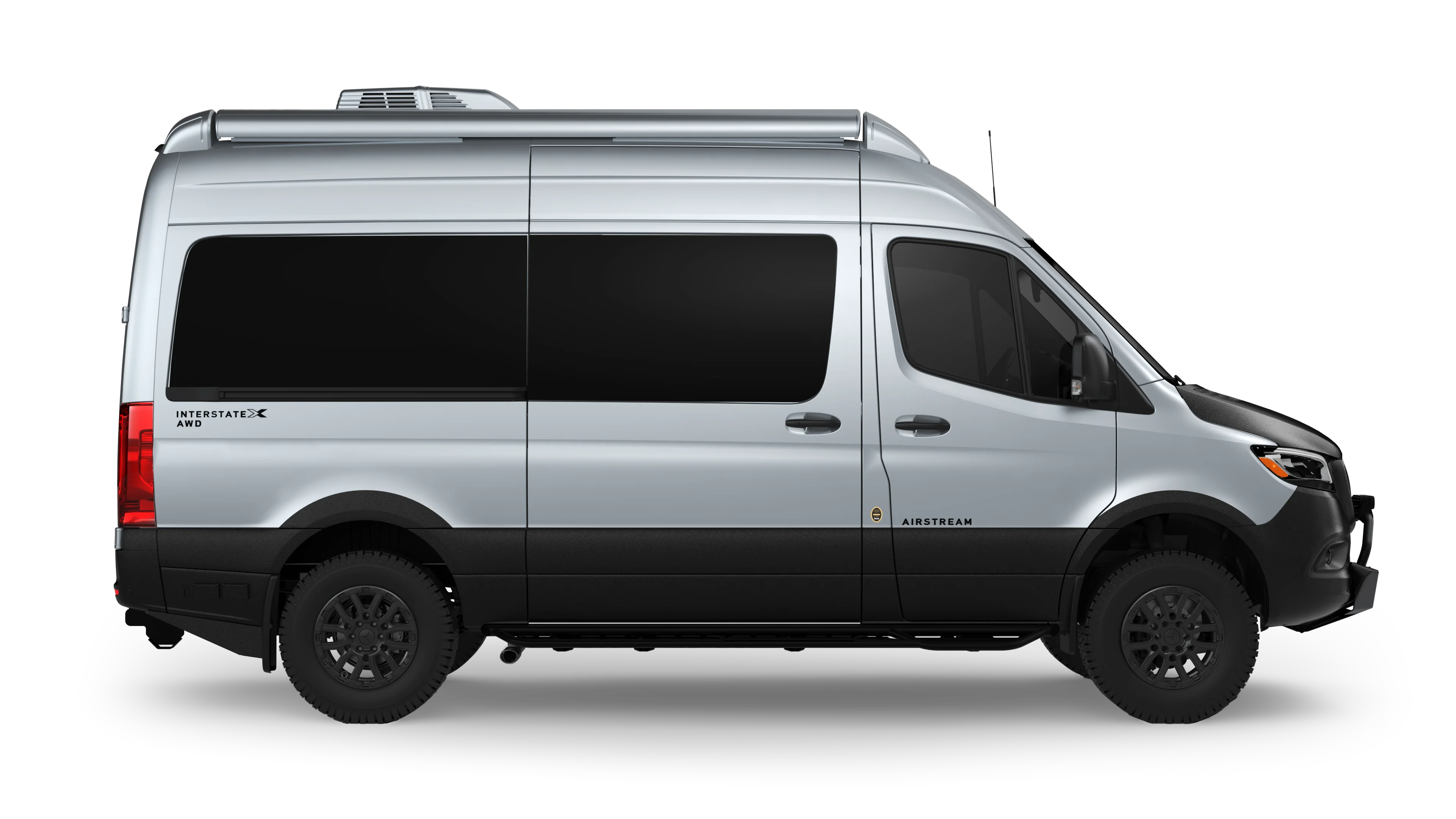 Silver Airstream Interstate AWD van, side view with black accents and tinted windows, set against a plain background.