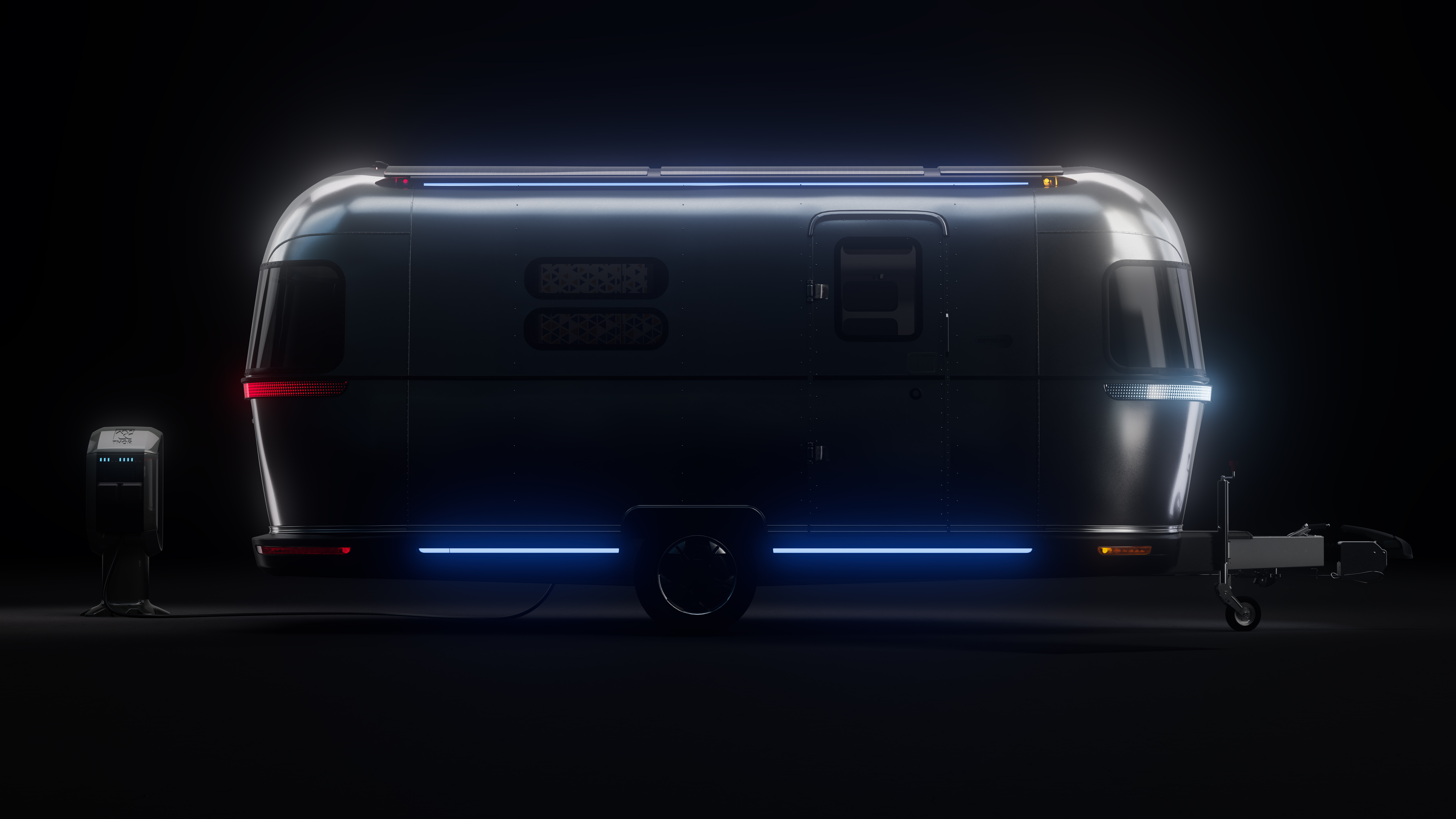 A sleek, futuristic trailer with illuminated edges stands in a dark setting, next to an electric charging station.