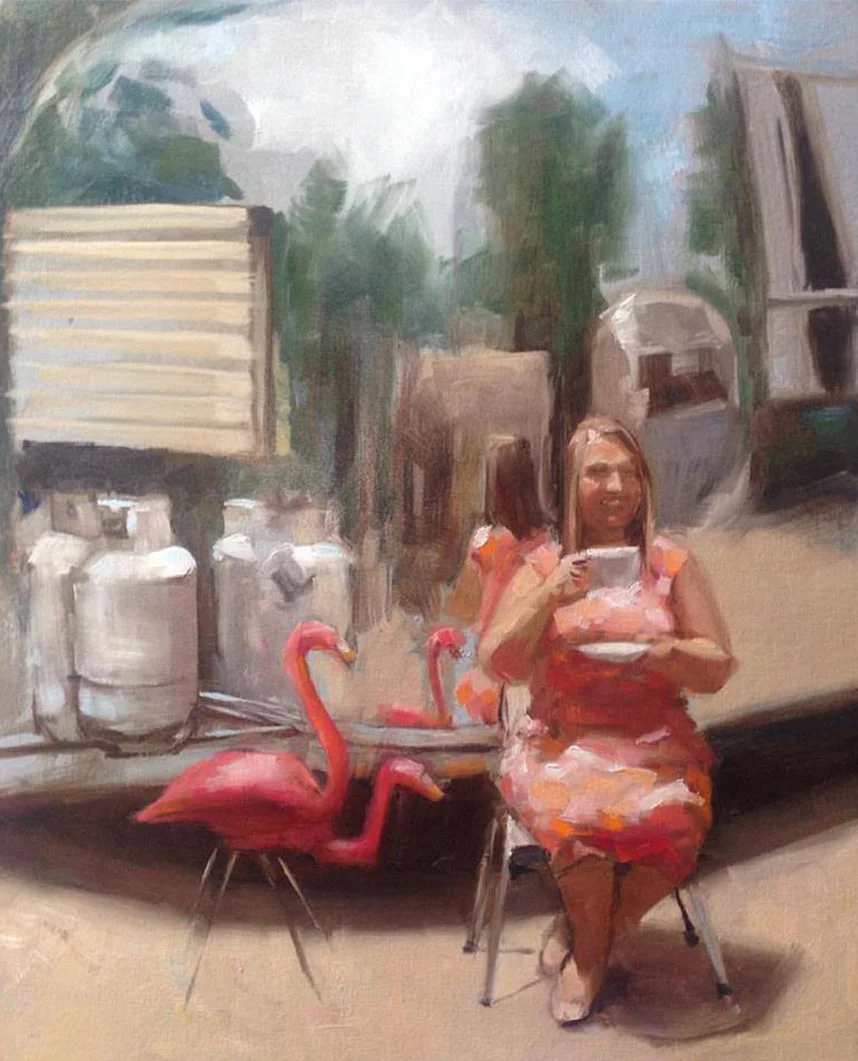 A woman in a floral dress sits outside, sipping from a cup, surrounded by pink flamingo lawn ornaments and large gas tanks.