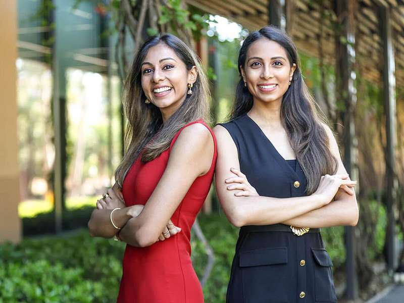 Sisters Simran and Krsna Mohnani smile for the camera