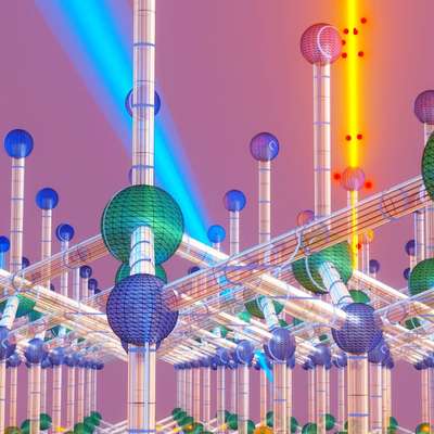 Digital illustration shows ionizing radiation as glowing beams striking a crystal lattice structure made of colored spheres.