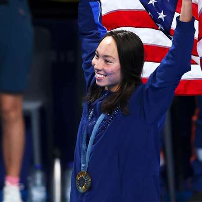 Stanford junior Torri Huske celebrates winning gold in the 100 butterfly.