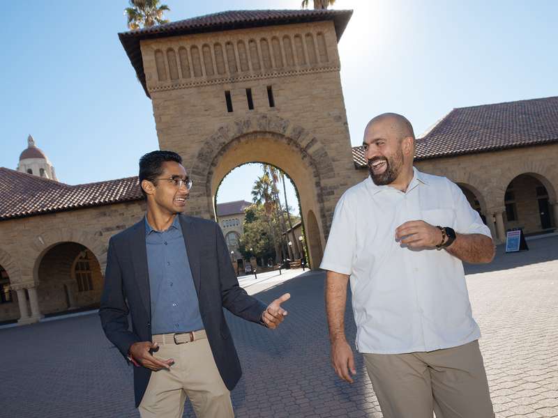 Ronak Vyas and Micky Chahcoi walking on the Stanford campus