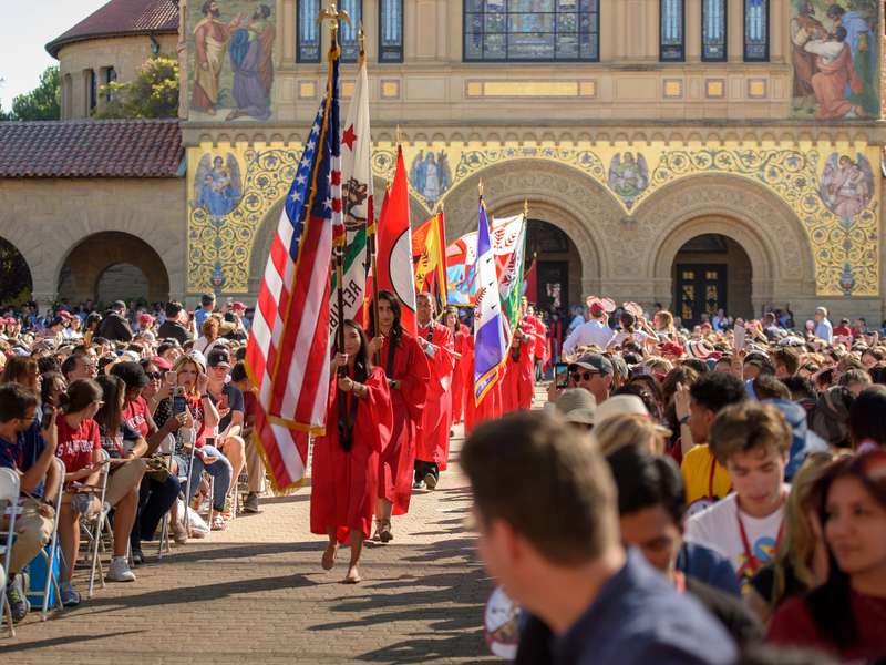 A processional of flags begins Stanford's Convocation.