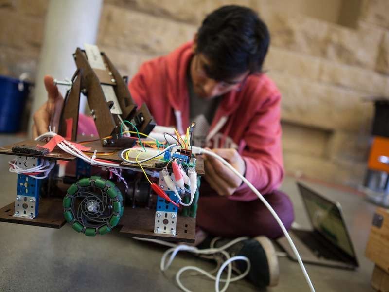 Student building robot