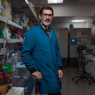 Eric Appel standing in his lab