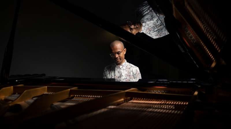Stanford student Jadon Geathers plays the piano in Roble Gym