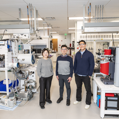 Researchers standing at the SLAC-Stanford Battery Center: Junghwa Lee, Zhelong Jiang, and Nicolas B. Liang.