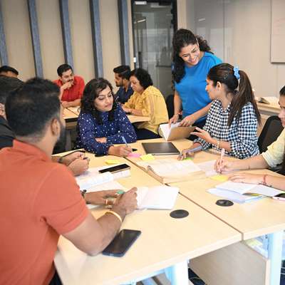 Class of students in India working together
