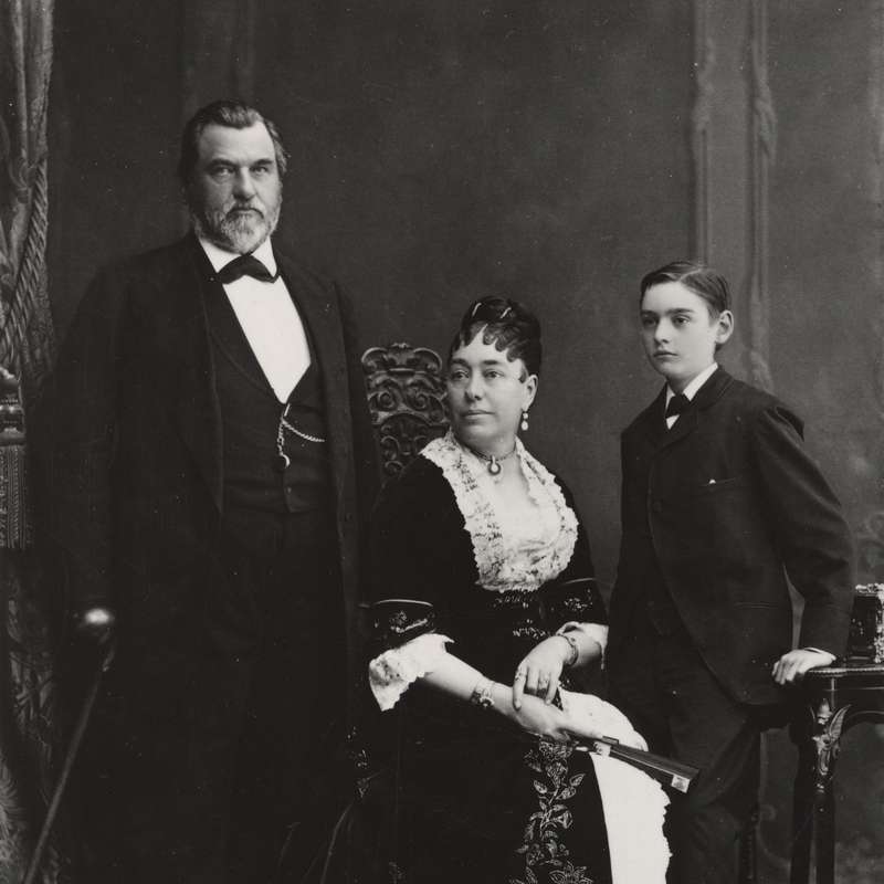 The Stanford family, Leland, Jane, and their son Leland Jr., pose together for a photo.