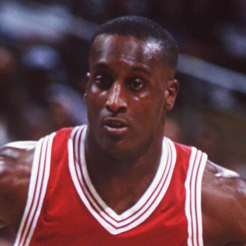 Brevin Knight in a Cardinal basketball jersey on the court during a game.