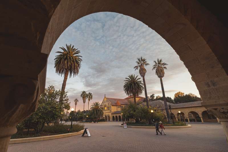 The quad at dusk with a pink and blue sky.