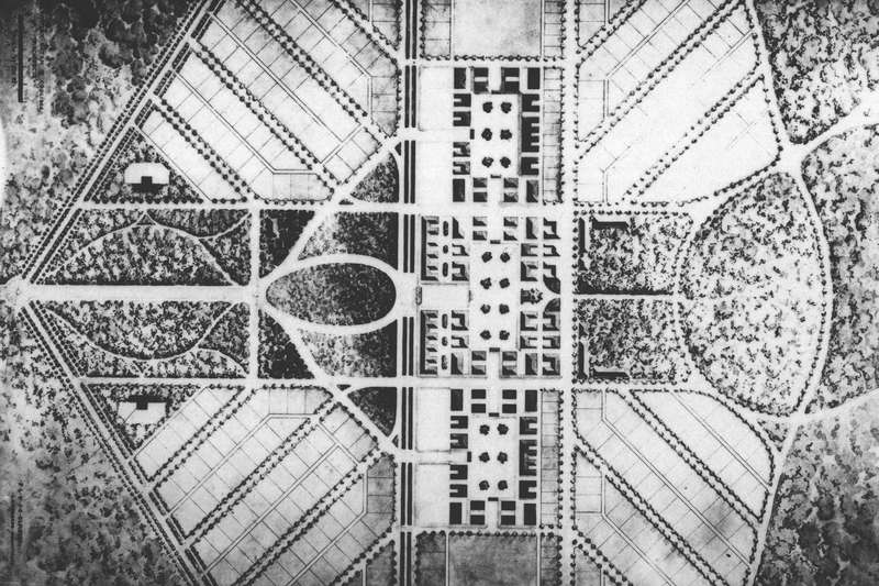 A black and white aerial layout of Frederick Law Olmsted's design for the university.