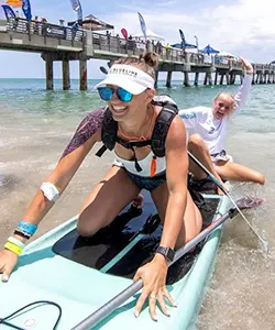 Jamie with Piper paddle boarding