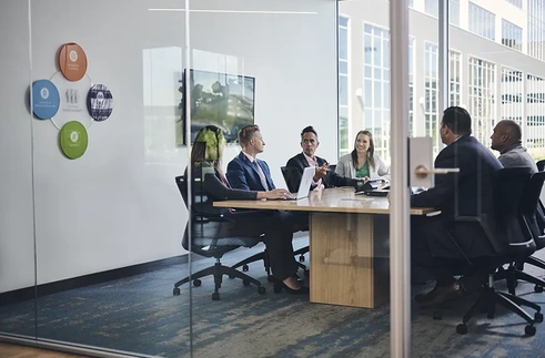 group of CHG professionals in a conference room