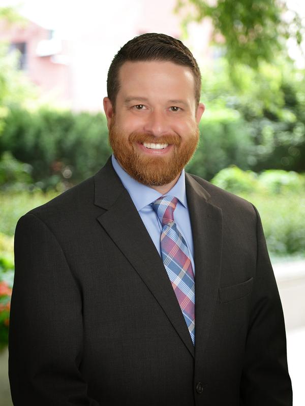 Portrait headshot of Joshua Scott