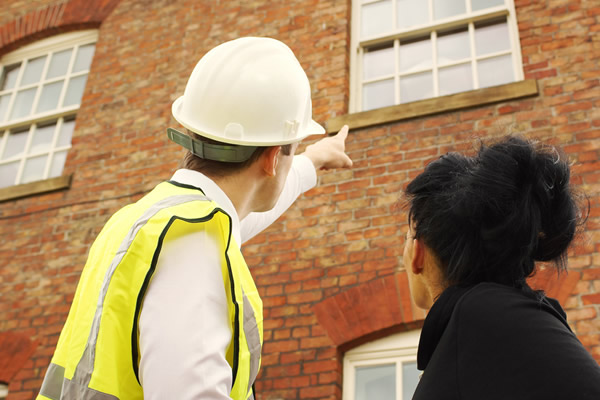 Contractor and customer having a conversation