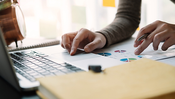 A person works on a business plan.