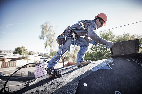 Roofer on a roof