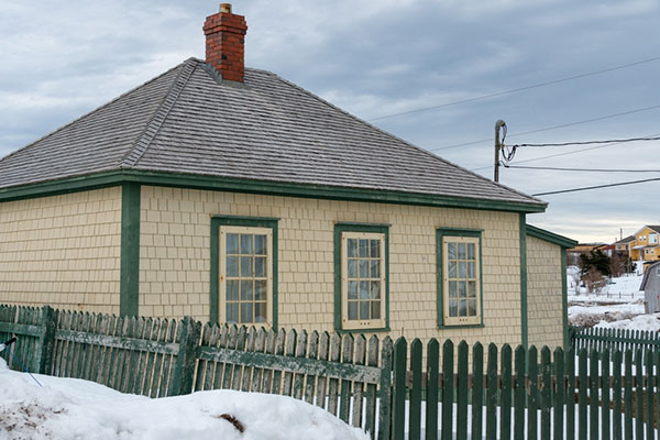 A single-story home with a hip roof.