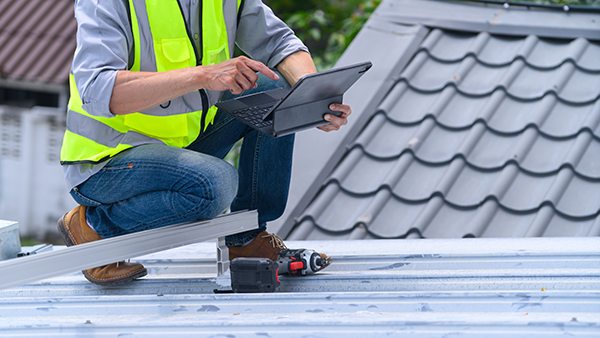 Connected roofing contractor communicating with clients
