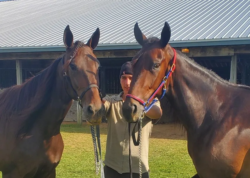 Westwinds Yahtzee (right) with her sister Westwinds Pegasus and Orva Eicher, Sam’s brother. .jpg