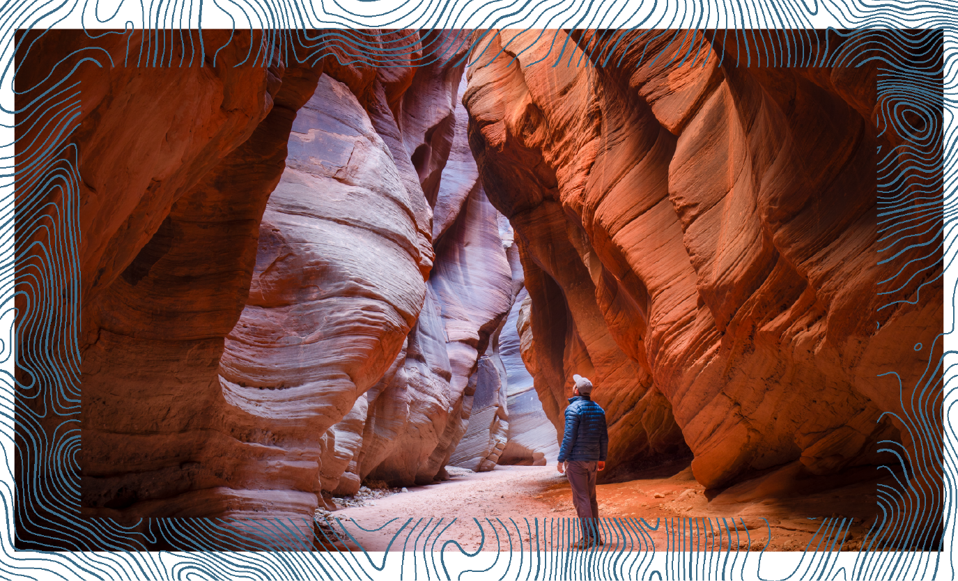picture of person exploring slot canyon in Utah