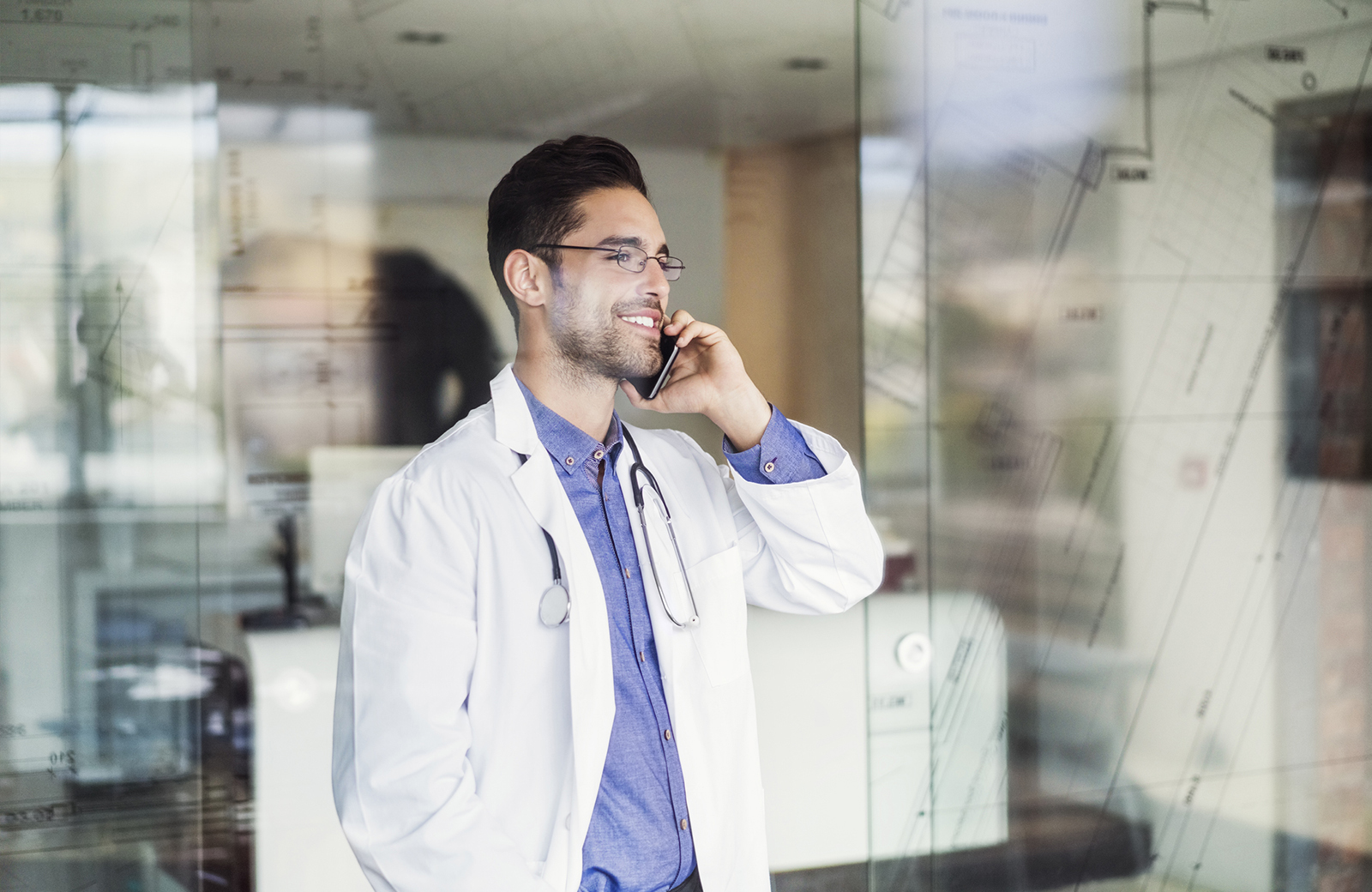 Physician on a mobile phone