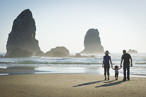 picture of family on coast of Seaside, OR