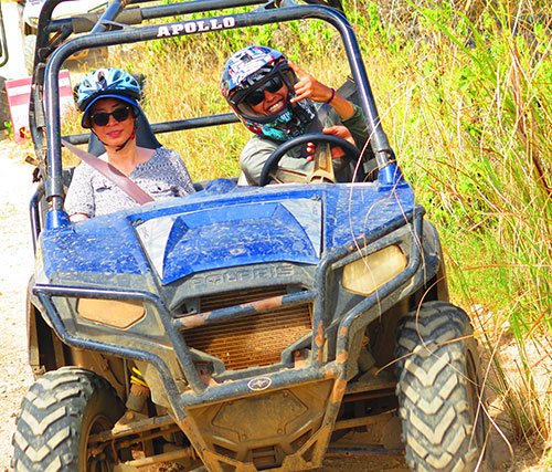 Dr. Ming four-wheeling in Guam