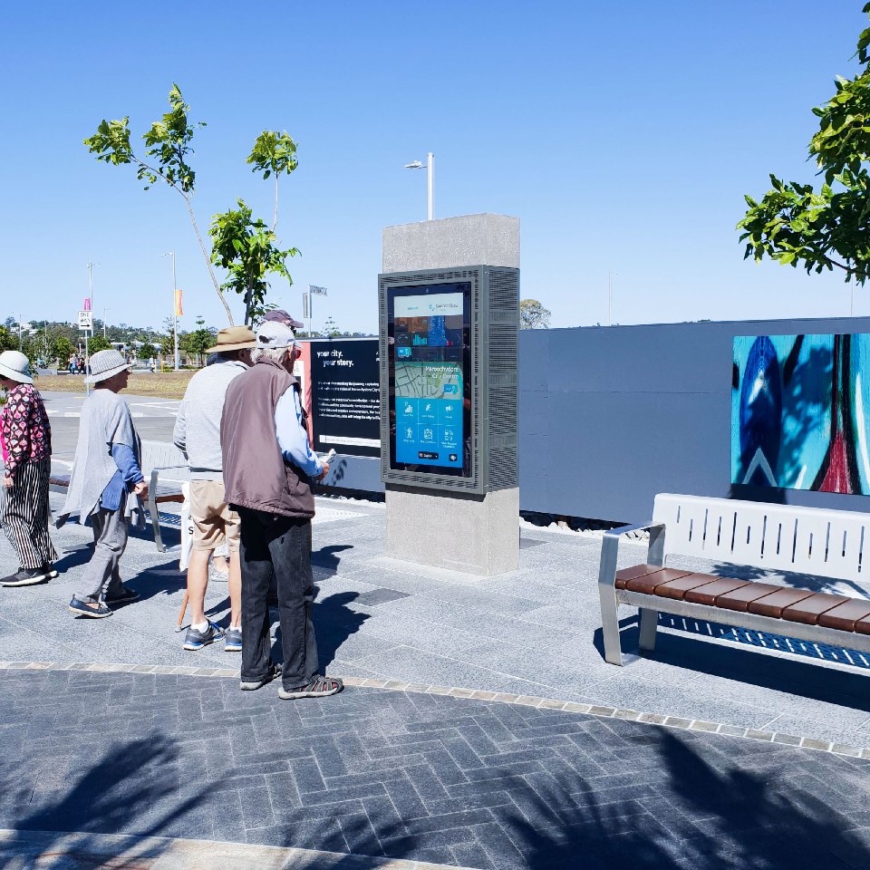Visitor-using-interactive-kiosk-powered-by-AE613