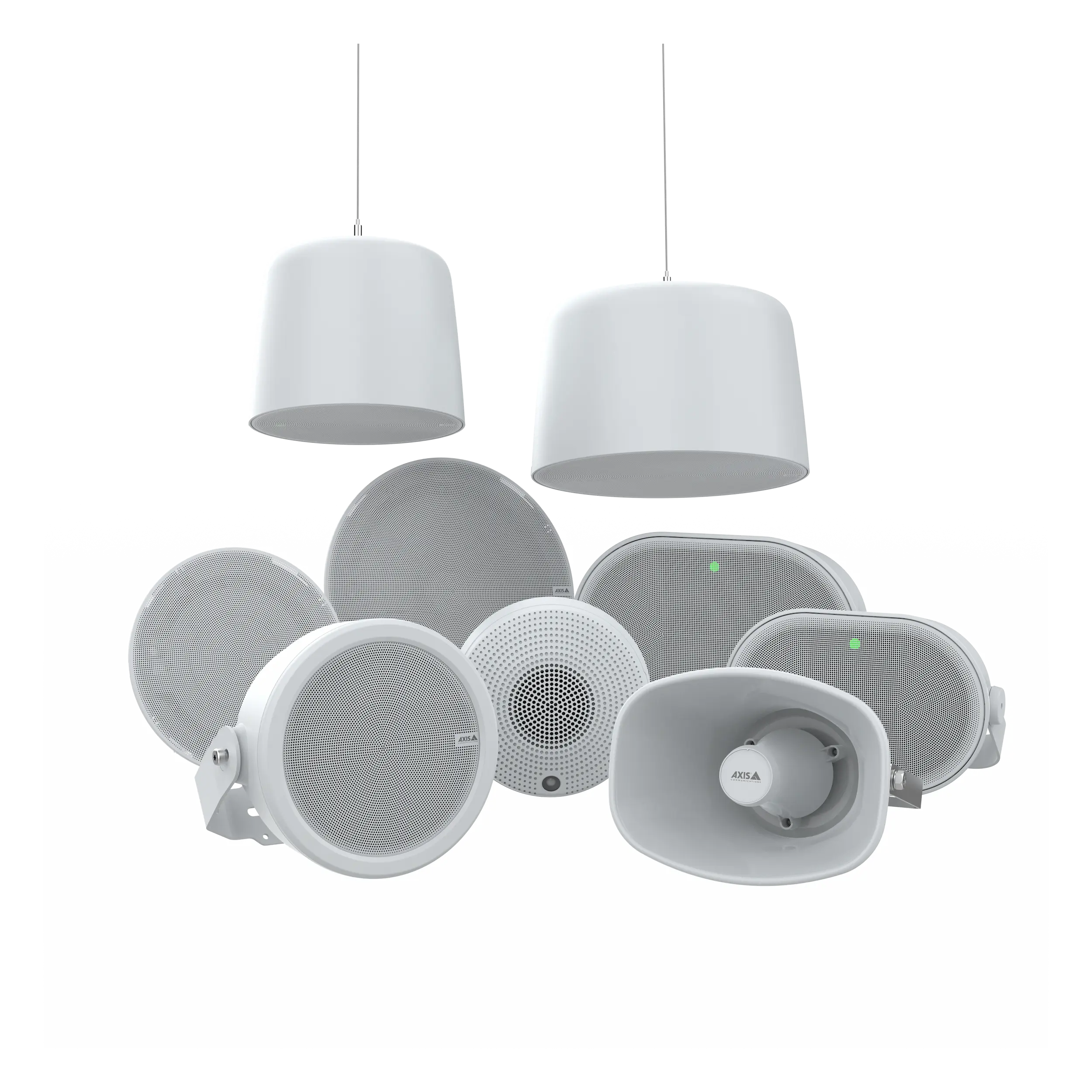 Various white audio speakers, including ceiling and wall-mounted types, displayed together.