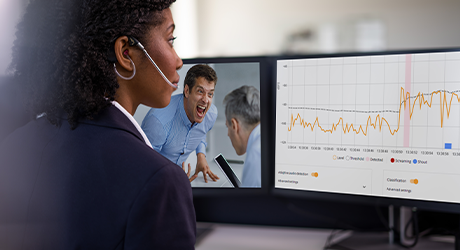 Woman looking at analytics on the computer screen