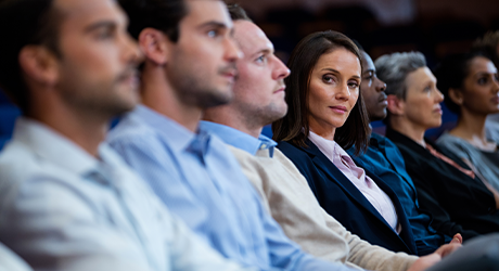 a group of people at a conference