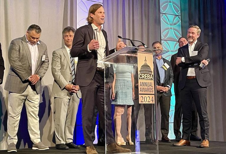JLL's Evan Behr and Doug Mueller won the James L. Eichberg Broker Of The Year award.