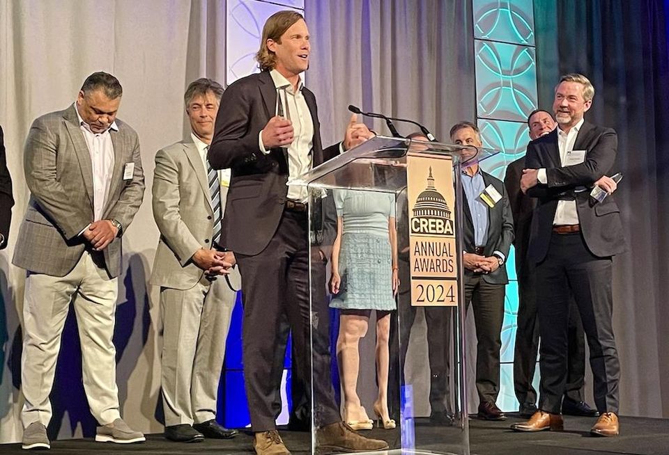JLL's Evan Behr and Doug Mueller won the James L. Eichberg Broker Of The Year award.