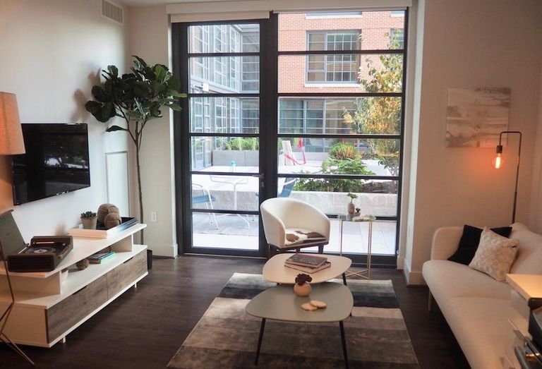 The living room inside the model unit at The Wharf's 148-unit Incanto building
