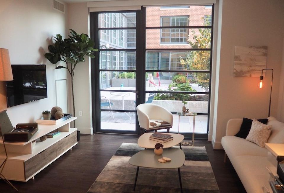 The living room inside the model unit at The Wharf's 148-unit Incanto building