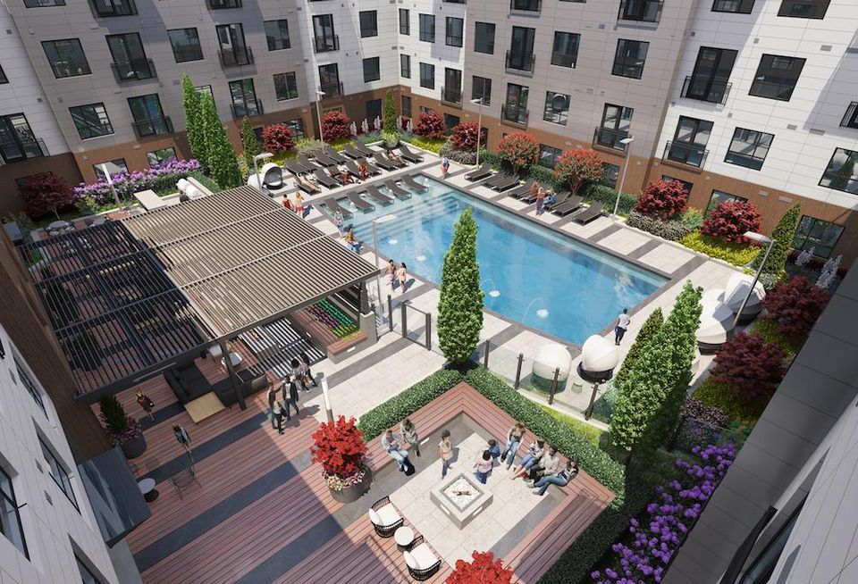 The outdoor pool and courtyard at the Trellis House development