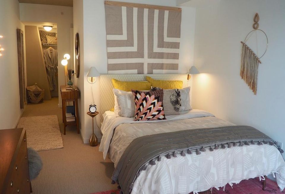 The bedroom in the 1-br model unit at The Channel