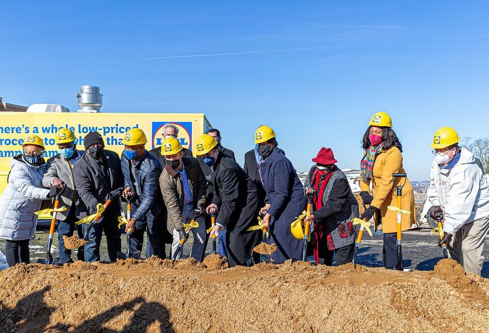 City officials and leaders from Lidl break ground at the grocer's new location in Skyland Town Center.