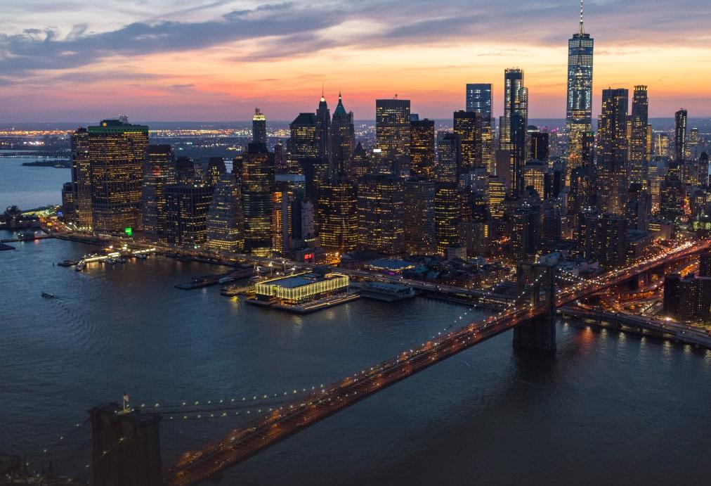 Aerial image of the Seaport District in Lower Manhattan, with the Brooklyn Bridge in the foreground