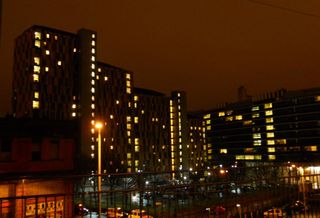 Manchester after dark night towers lights windows 