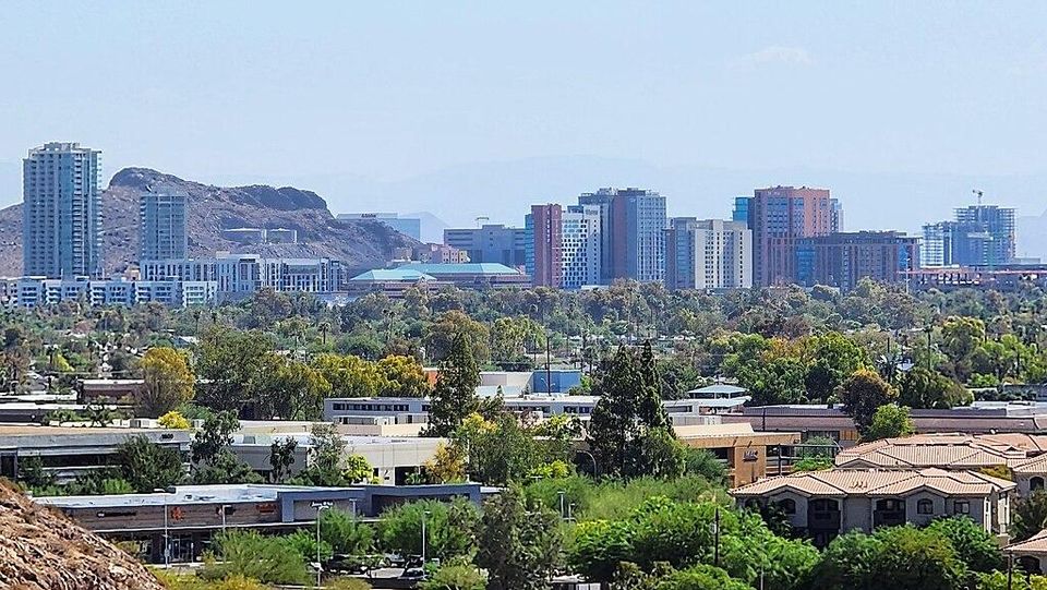 Offices, a mountain, and houses