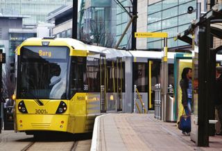 Manchester metrolink tram at Market Street stop